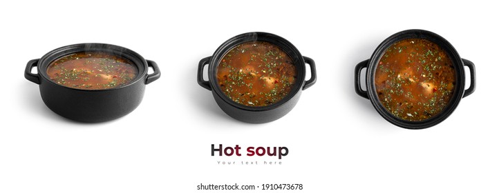 Hot Soup In A Black Pot Isolated On A White Background. High Quality Photo