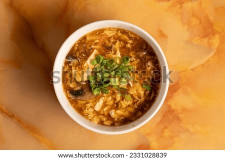 Hot and sour soup in a bowl