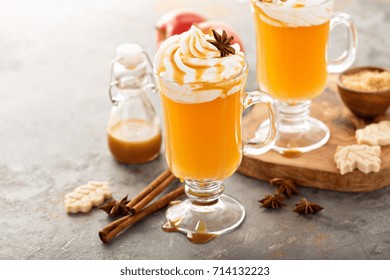 Hot Spicy Apple Cider With Whipped Topping And Brown Sugar