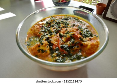 Hot and spicy indian fish curry