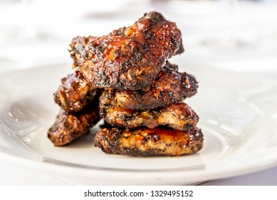 Hot and Spicy Jerk Chicken Wings, served in an upmarket Caribbean restaurant.