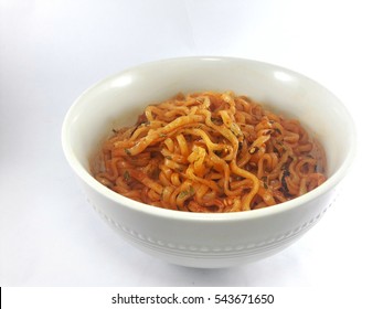 Hot and Spicy Korean Samyang ramen noodles in white bowl isolated on white background