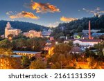 Hot Springs, Arkansas, USA townscape at dusk in the mountains.