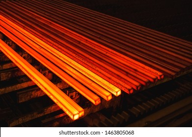 Hot square steel bloom on the roll-table - Shutterstock ID 1463805068