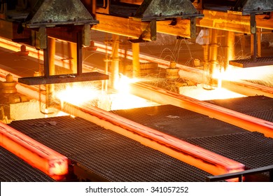 Hot Steel On Conveyor In Steel Mill