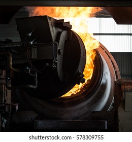 Hot steel pouring in steel plant, iron, aluminium - Shutterstock ID 578309755