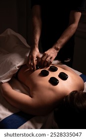 hot stone massage, spa treatment, relaxation, wellness therapy, body care, back massage, holistic healing, professional massage, health spa, stress relief, hot stones, luxury spa, body therapy