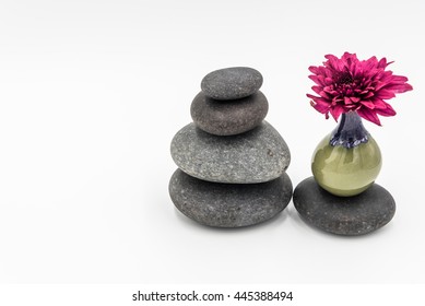 Hot stone,Ceramic and red flower for spa,resort,hotel concept.