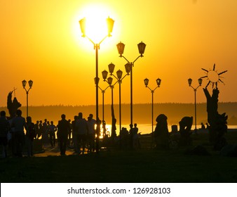 Hot Summer Evening On The City Waterfront