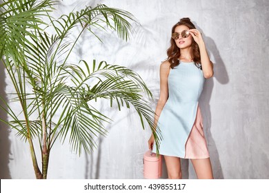 Hot summer girl beauty sexy lady wear fashion dress casual clothes party date time model woman luxury life style accessory bag jewelry bijou studio green palm shadow catalog collection pretty face