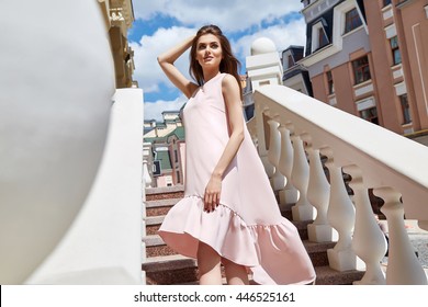 Hot Summer Girl Beauty Sexy Lady Wear Fashion Silk Pink Dress Casual Clothes Party Date Model Woman Luxury Life Style Accessory Catalog Collection Pretty Face Walk On Stairs Buildings In Modern City 