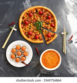 Hot sushi rolls, pizza with cherry tomatoes and spicy soup. lunch at oriental restaurant. Top view. Food concept. Square format or 1x1 for posting on social media.