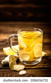 Hot Sweet Ginger Tea With Lemon In Glass Mug