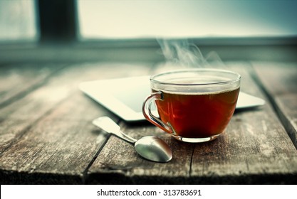 Hot Tea Cup On A Frosty Winter Day Window Background