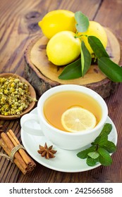Hot tea with lemon in the cup closeup