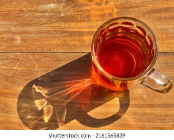 Hot Tea On The Wooden Table In The Morning Sunshine, Top Angle.