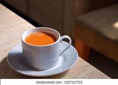 Hot Thai Tea In A Cup Placed On The Table, Morning Drink.