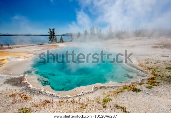 Hot thermal spring Black\
Pool in Yellowstone National Park, West Thumb Geyser Basin area,\
Wyoming, USA