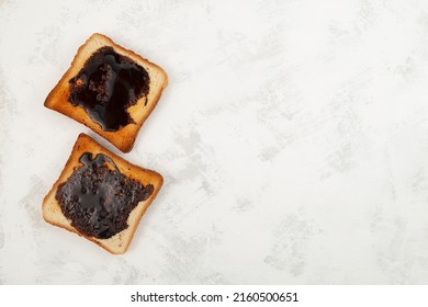 Hot toast for breakfast. Roasted Aussie savory toasts with vegemite. Vegemite is a very popular yeast based spread in Australia.