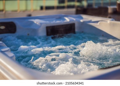 Hot tub hydromassage pool. Illuminated pool. Rest outside the city. Cottage with hydromassage pool - Shutterstock ID 2105634341