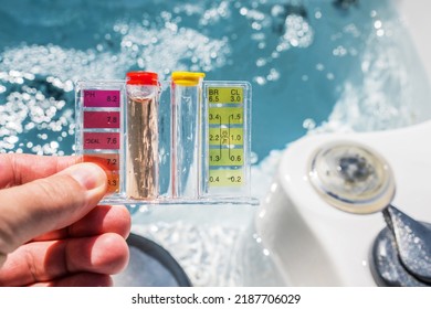 Hot Tub Water Quality Check By Using Chemical Testing Kit. PH, Chlorine And Bromine Concentration. Garden SPA Water Maintenance.