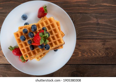 Hot waffle with fresh fruits 