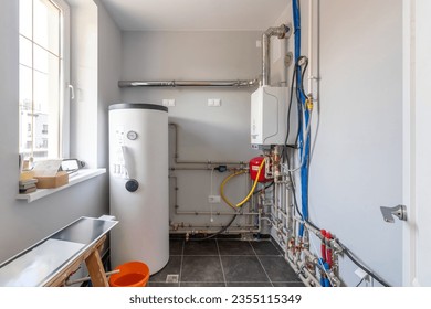 Hot water boiler. Boiler room with a heating system.