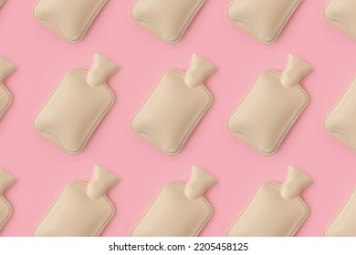 Hot Water Heating Pad Pattern On Pink Background. Winter Essentials.  Power Outages And Difficulties With Heating. Saving Electricity. Cramps Problems, Heat Therapy And Cooling Down.