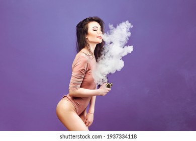 Hot Woman In Bodysuit Standing And Vaping