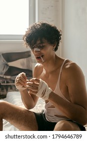 Hot Young Guy Fighter. Portrait Of A Model, Curly Hair, Muscles, Retro Movie Style. White Shirt, Beautiful Face. Smoking Cigarette. Good For Print. 