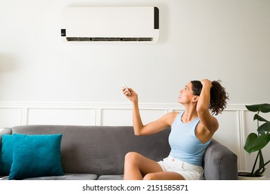 Hot Young Woman Feeling Sweaty During A Heat Wave Because Her Air Conditioning Is Not Working 