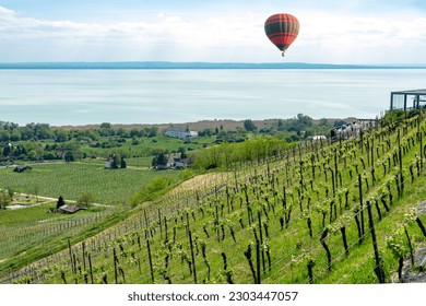 hot-air balloon over lake Balaton in Hungary .