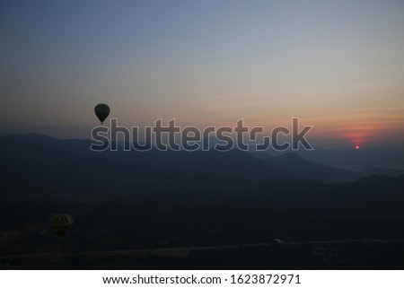 Hotairballoon in the sky on the sunrise at LAOS
