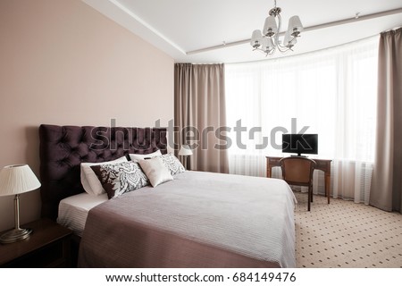 Hotel apartment, bedroom interior in the morning