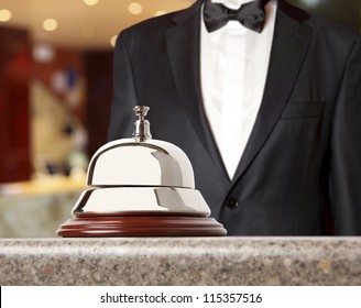 Hotel Concierge.  Service Bell At The Hotel