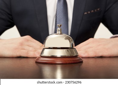 Hotel Concierge. Service Bell At The Hotel