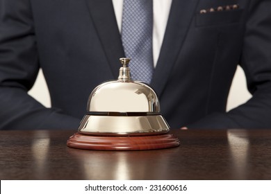 Hotel Concierge. Service Bell At The Hotel