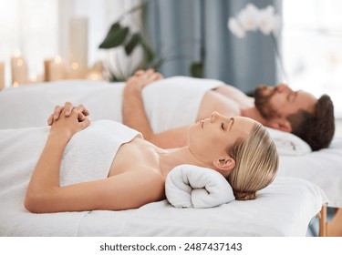 Hotel, couple and spa for massage, relax on vacation and wellness with weekend break, rest and calm. People, man and woman with beauty salon, stress relief and time together with service and luxury - Powered by Shutterstock