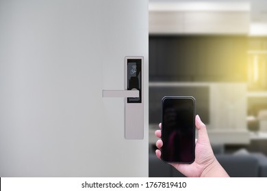 Hotel Door Security Unlocking By Application On Mobile Phone. Digital Door Lock, Key Less System Of Access Door. Close Up And Selective Focus.