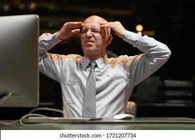 Hotel Elderly Male Manager Made A Mistake In The Bill. Man In Stress In Front Of A Computer.
