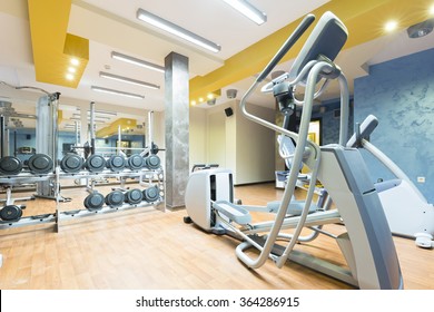 Hotel Gym Interior With Equipment

