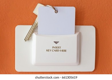 Hotel Key Card Holder On Orange Wall 