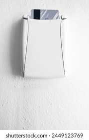 Hotel key card reader with card for powering electricity.
