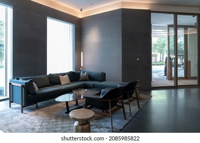 Hotel lobby interior with sofas, Minimalist design with terrazzo walls and marble floors, elegant lighting and furniture.