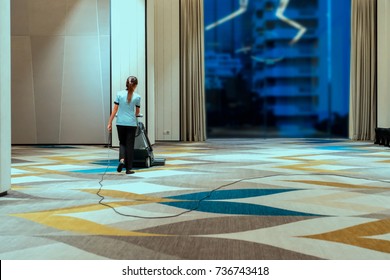 Hotel Maid Cleaning Carpet Meeting Room , Hotel Services.