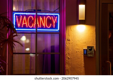 Hotel With Neon Vacancy Sign Lit