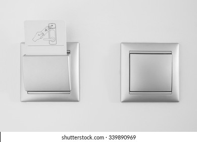 Hotel Open Room Card System With Light Switch White Wall. Horizontal