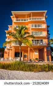 Hotel And Palm Trees On The Beach In Fort Myers Beach, Florida.