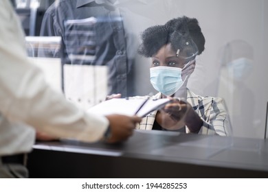 Hotel Reception Desk Protected By Medical Mask