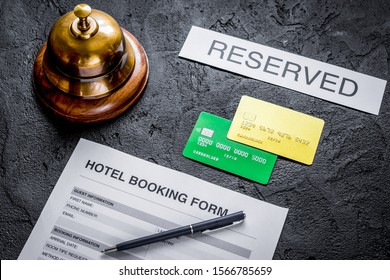 Hotel Reservation Blank And Ring On Dark Background